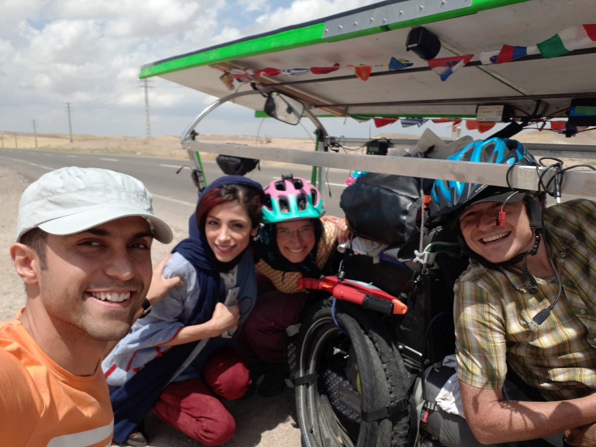 At some point we decided we were going to take a break from stopping every time a car pulled over to chat, but then we saw the smile on this couple and had to say hi.
They gave us travel pointers for hotsprings in the upcoming city of Sareyn, exchanged contacts, and later met up near Tehran at the end of the trip.